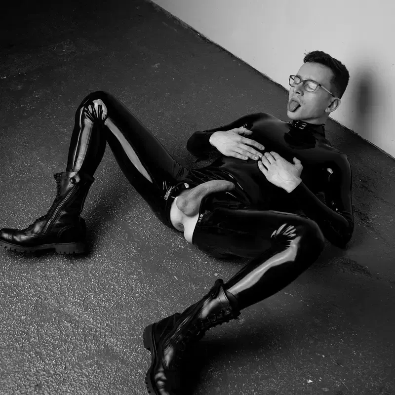 Rubber Boy David Licks His Own Boots 1