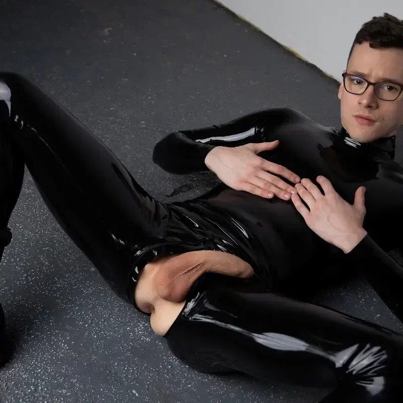 Rubber Boy David Licks His Own Boots